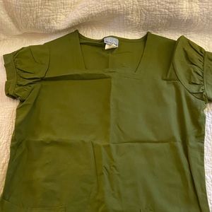 White swan scrub top. Perfect for St patty’s day